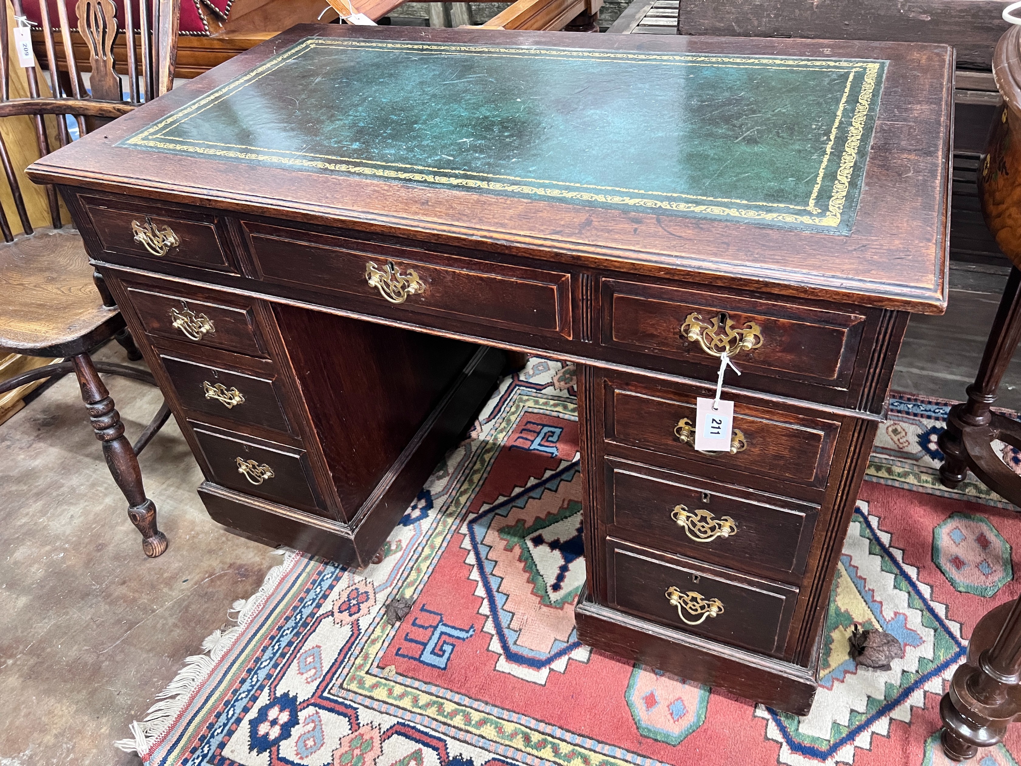 An Edwardian walnut pedestal desk, width 107cm *Please note the sale commences at 9am.
